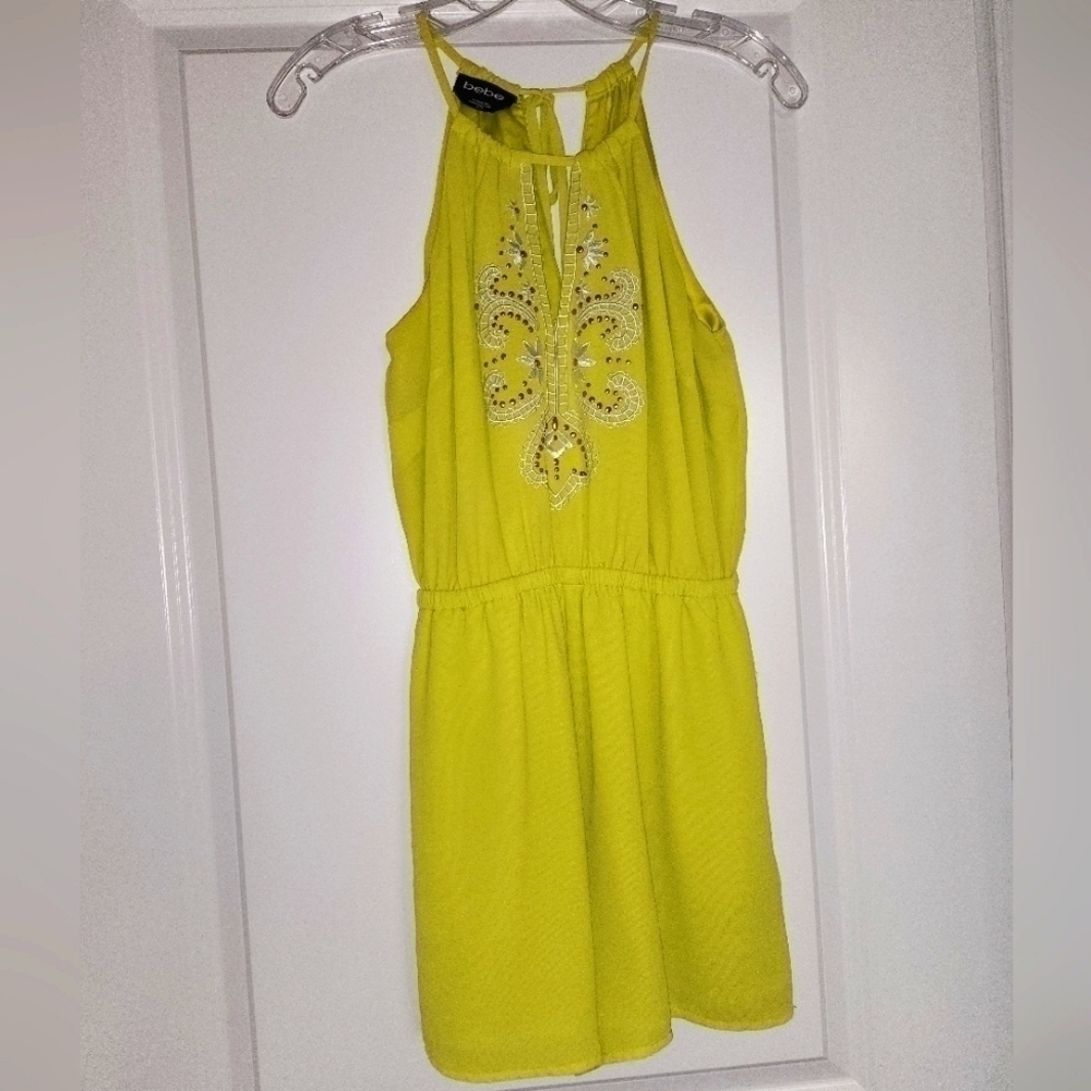 Bebe bright yellow romper with pockets Size X-Small